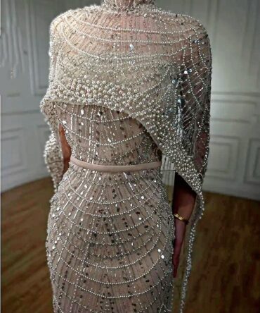 Embellished drop cape dress
